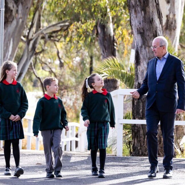 Tom Sexton with students from St Paul's Primary School, Mildura, on the Murray River, which forms the northern boundary of the Diocese of Ballarat.